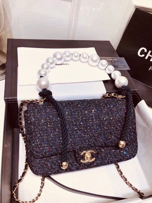 Chanel Pearl flap bag in black tweed