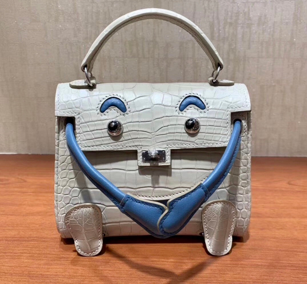 Hermes Kelly Idole (Kelly Doll) in GRIS PERLE Alligator with Palladium hardware.