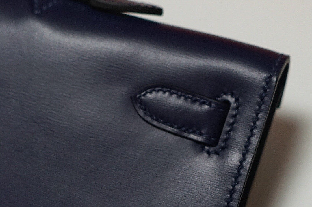HERMÈS Kelly Cut Black Boxcalf with Peacock Feather GHW Limited Edition