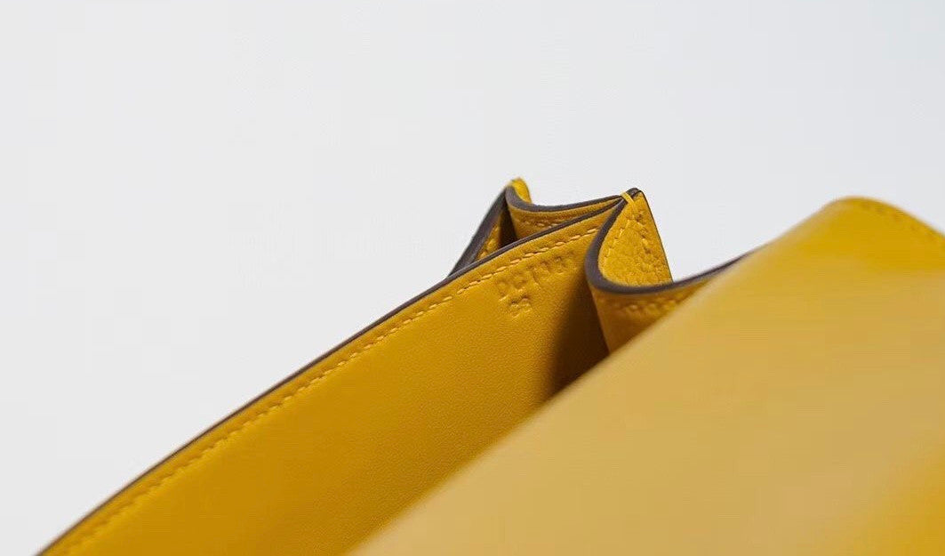 Hermes Jaune d'or Constance Epsom leather 18cm With Enamel Hardware