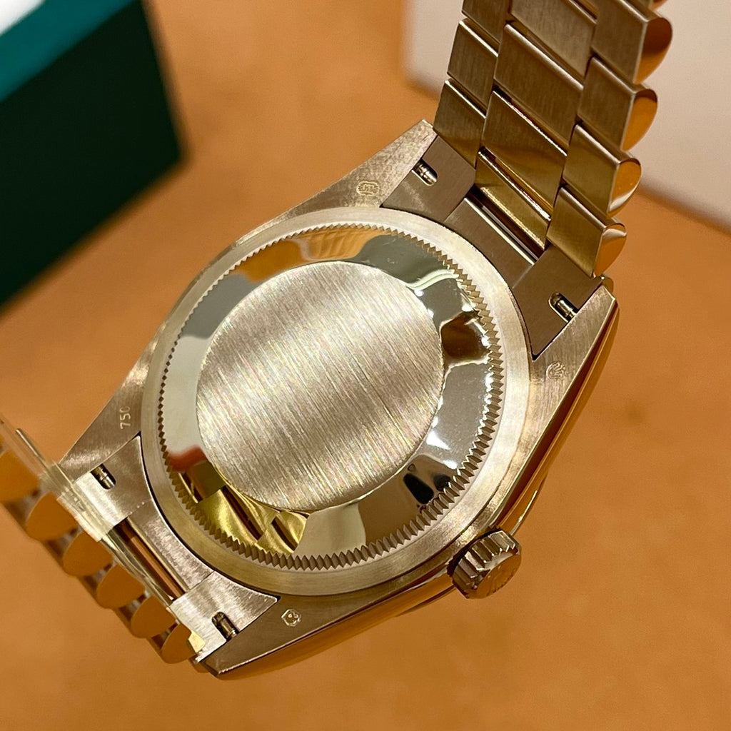 ROLEX DAY-DATE 36 18k Yellow Gold | White Mother-of-Pearl Baguette Dial | President Bracelet