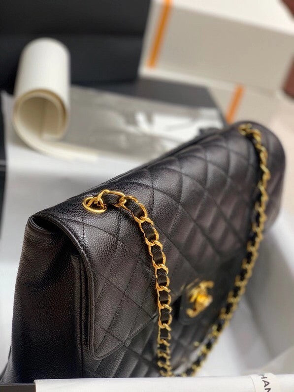 Chanel  BLACK QUILTED CAVIAR LEATHER JUMBO CLASSIC SINGLE FLAP BAG