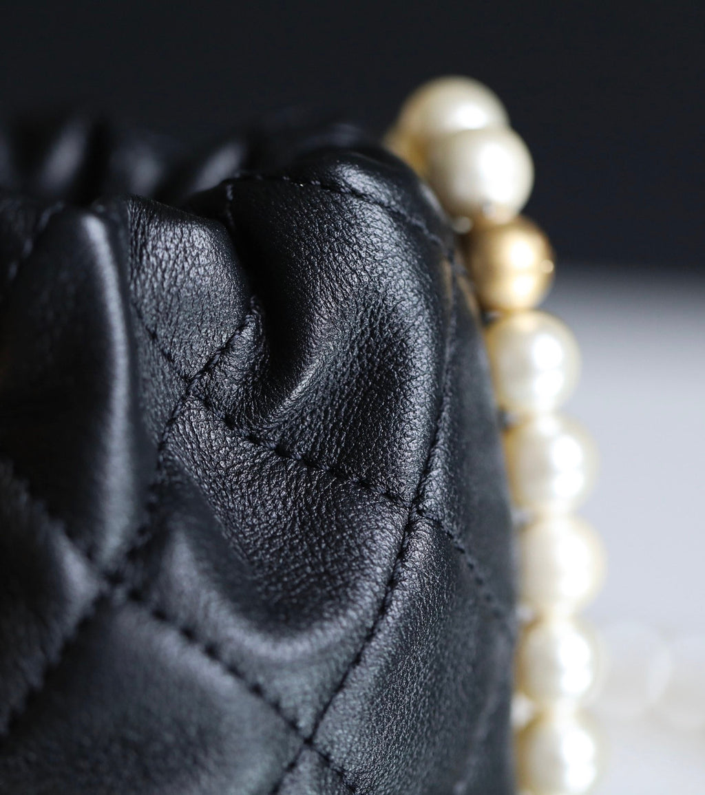 Chanel mini pearl drawstring bag