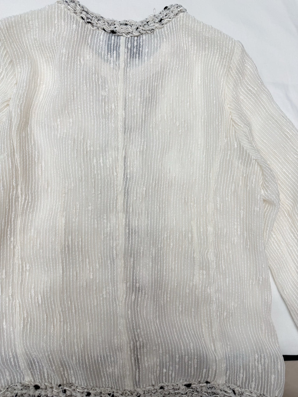 Chanel ivory cardigan - hem chain detail