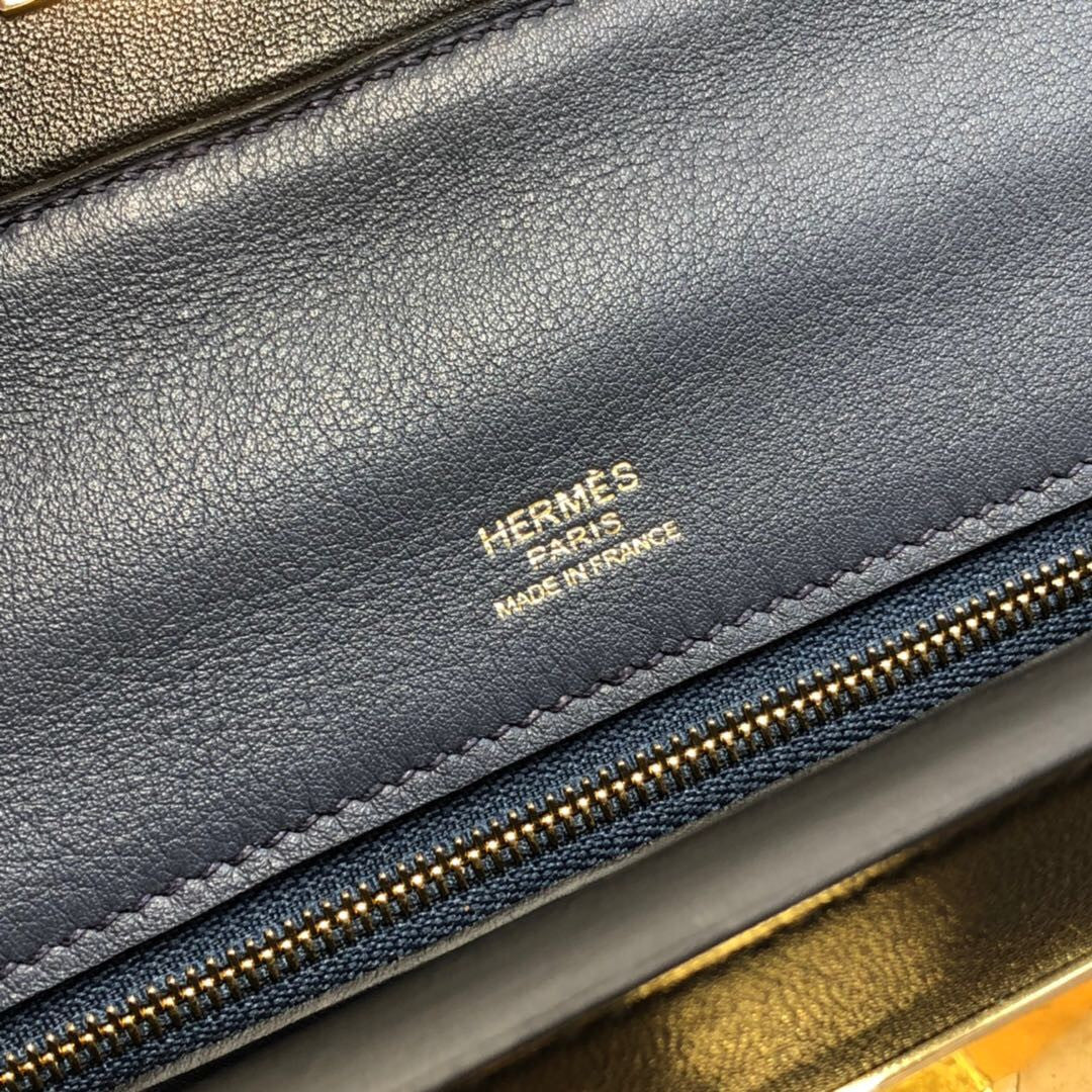 Hermes Kelly 24/24  Black/Navy Blue Swift & Togo Leather with Gold Hardware