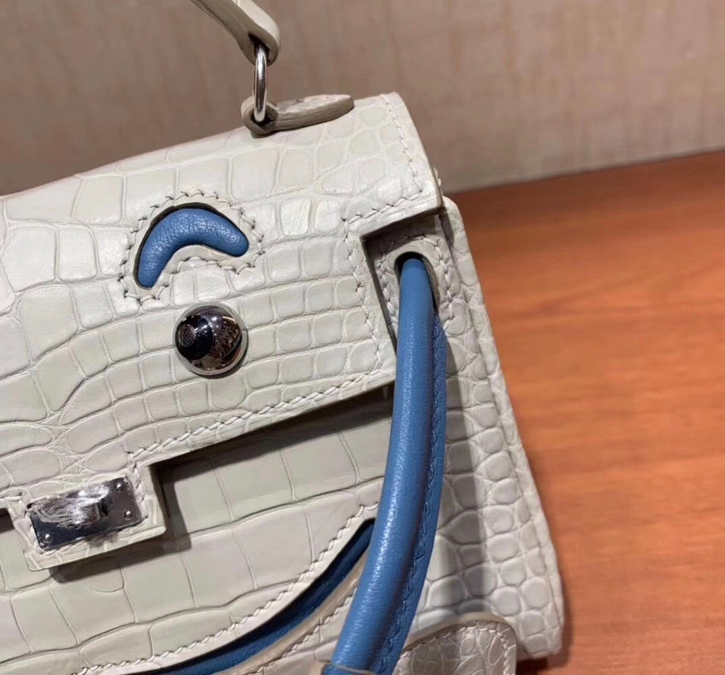 Hermes Kelly Idole (Kelly Doll) in GRIS PERLE Alligator with Palladium hardware.