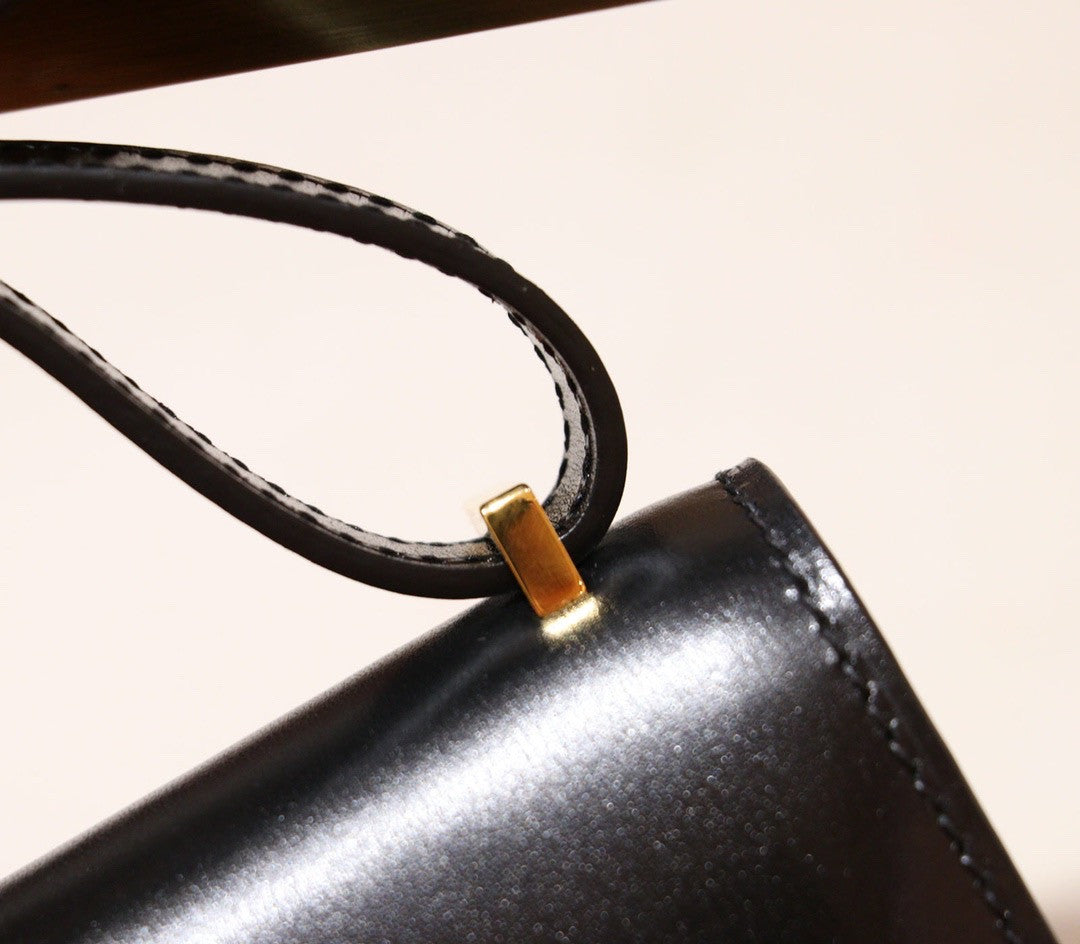 Hermès Hermes Constance micro handbag in black box leather