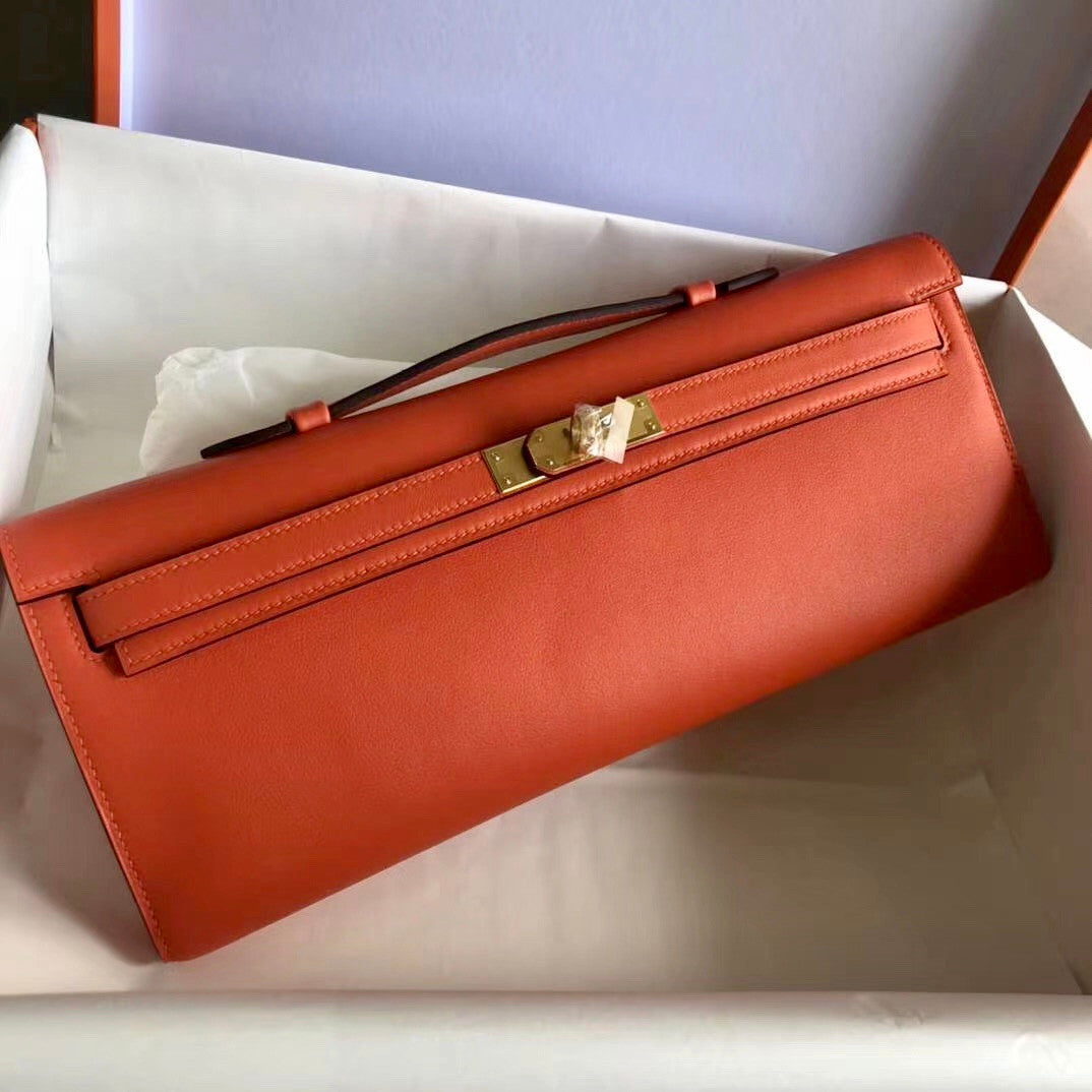 HERMES KELLY CUT CLUTCH BAG ORANGE SWIFT GOLD HARDWARE