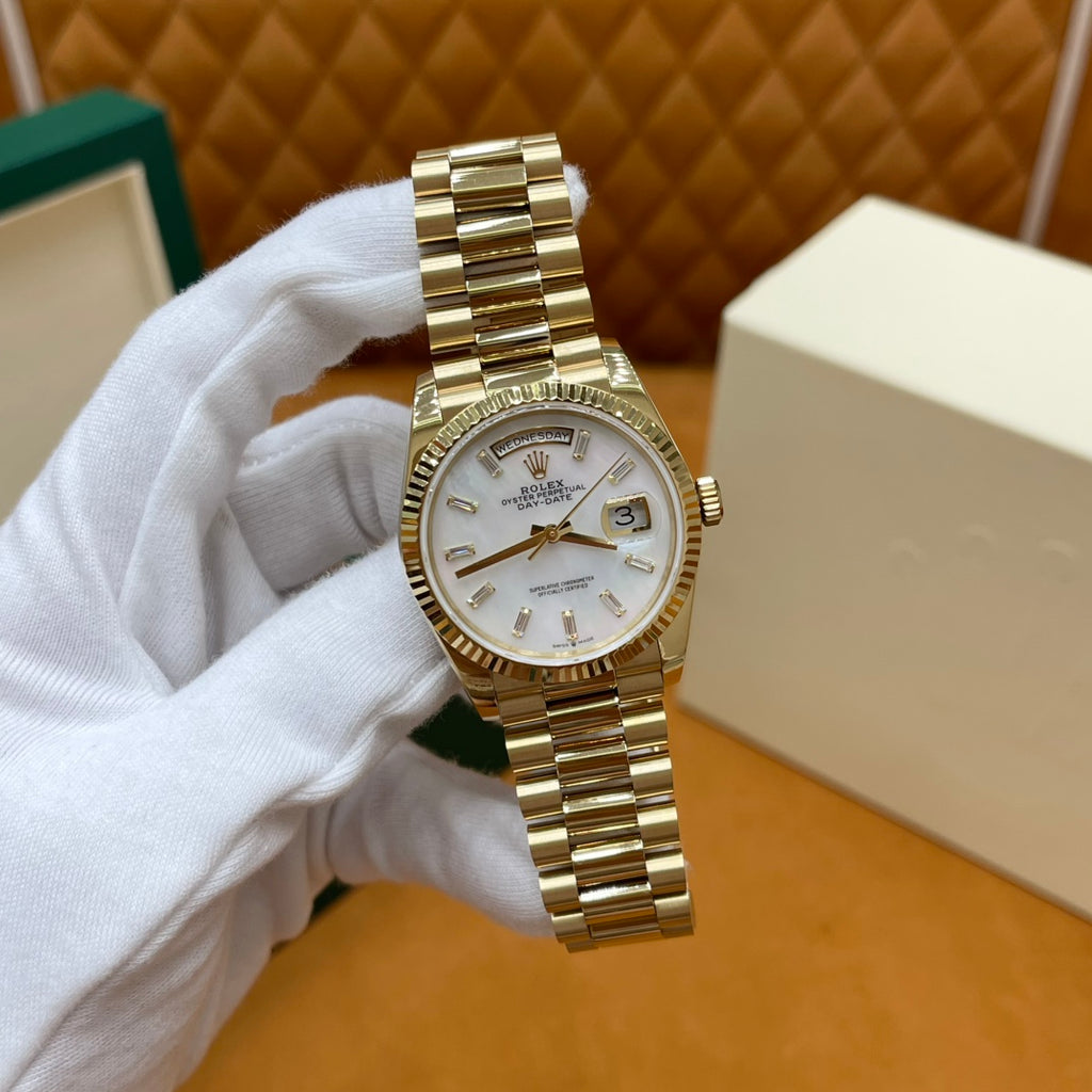 ROLEX DAY-DATE 36 18k Yellow Gold | White Mother-of-Pearl Baguette Dial | President Bracelet