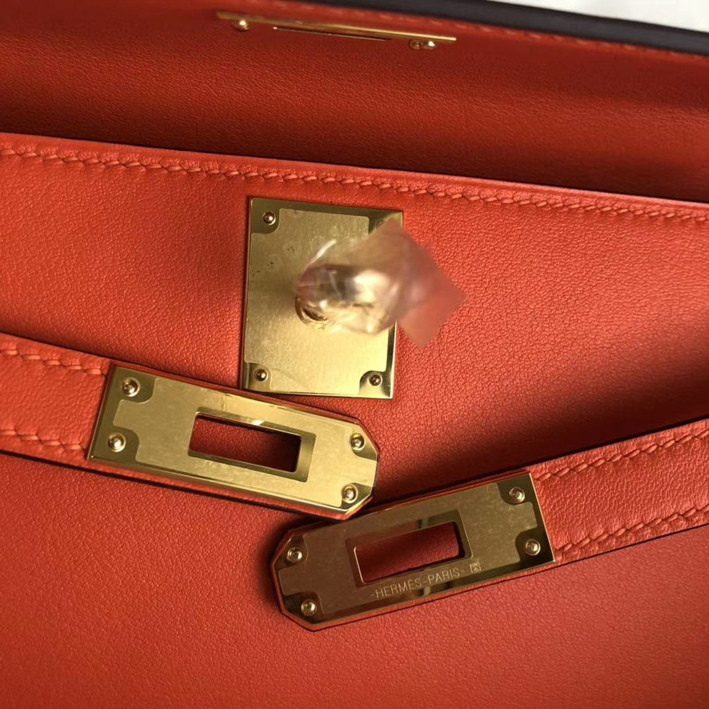 HERMES KELLY CUT CLUTCH BAG ORANGE SWIFT GOLD HARDWARE