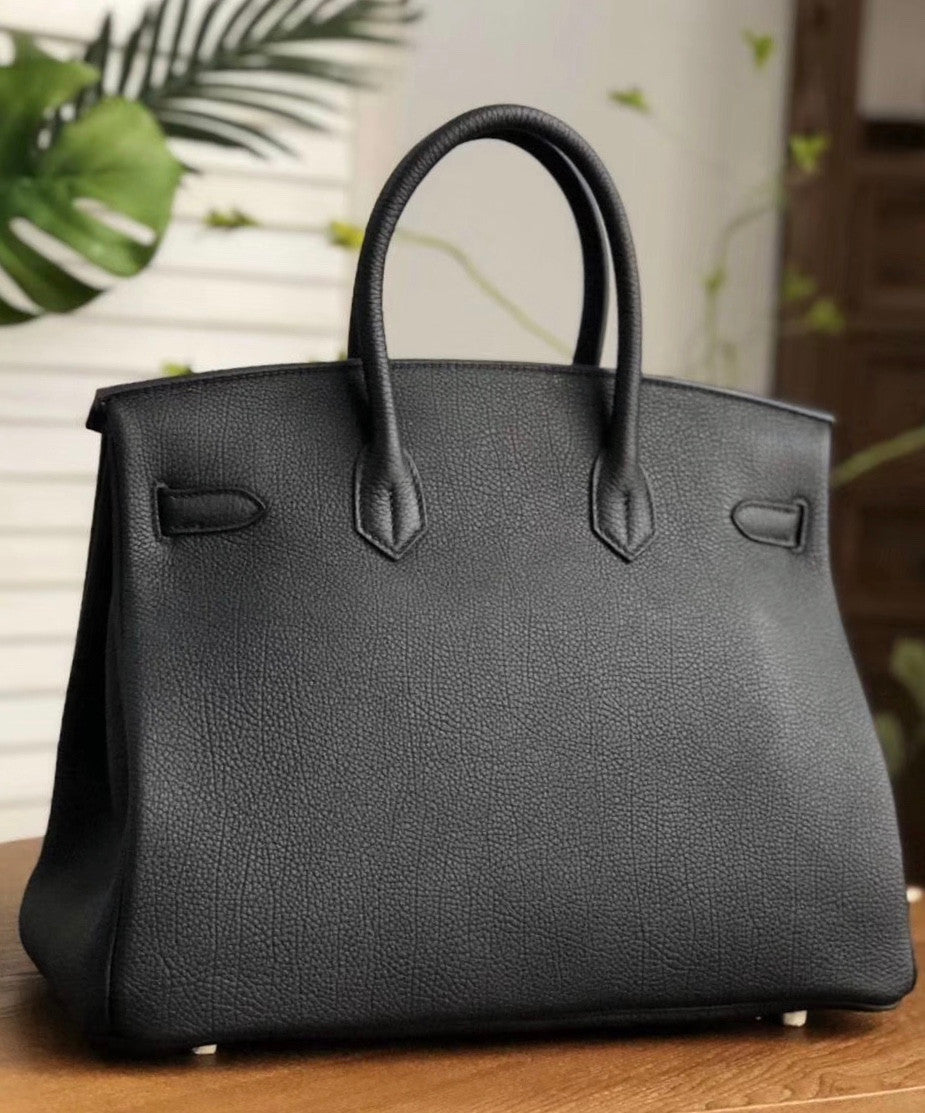 HERMÈS  LIMITED EDITION OFFICIER BIRKIN 35 BLACK TOGO HANDBAG