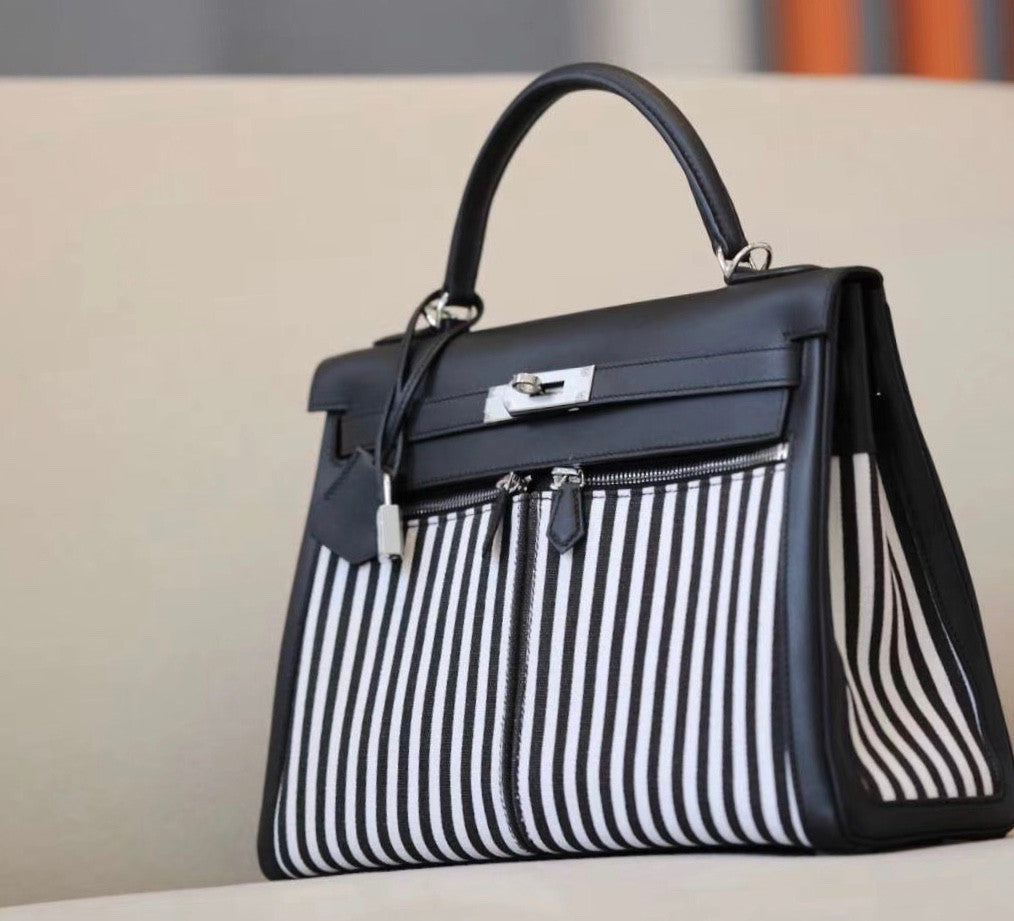 Hermes  LIMITED EDITION VERT ANGLAIS SWIFT LEATHER & TOILE RIGA LAKIS KELLY 32 WITH PALLADIUM HARDWARE