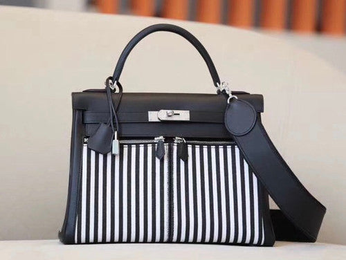 Hermes  LIMITED EDITION VERT ANGLAIS SWIFT LEATHER & TOILE RIGA LAKIS KELLY 32 WITH PALLADIUM HARDWARE