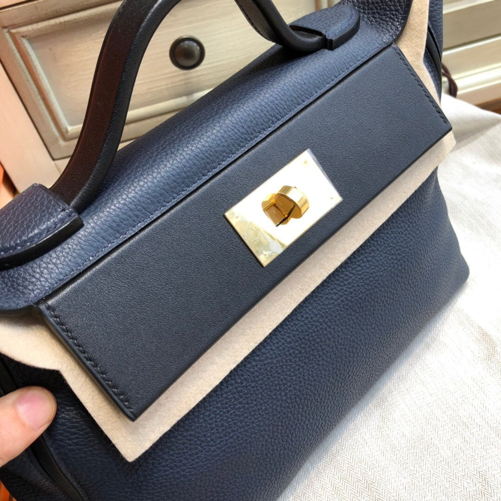 Hermes Kelly 24/24  Black/Navy Blue Swift & Togo Leather with Gold Hardware