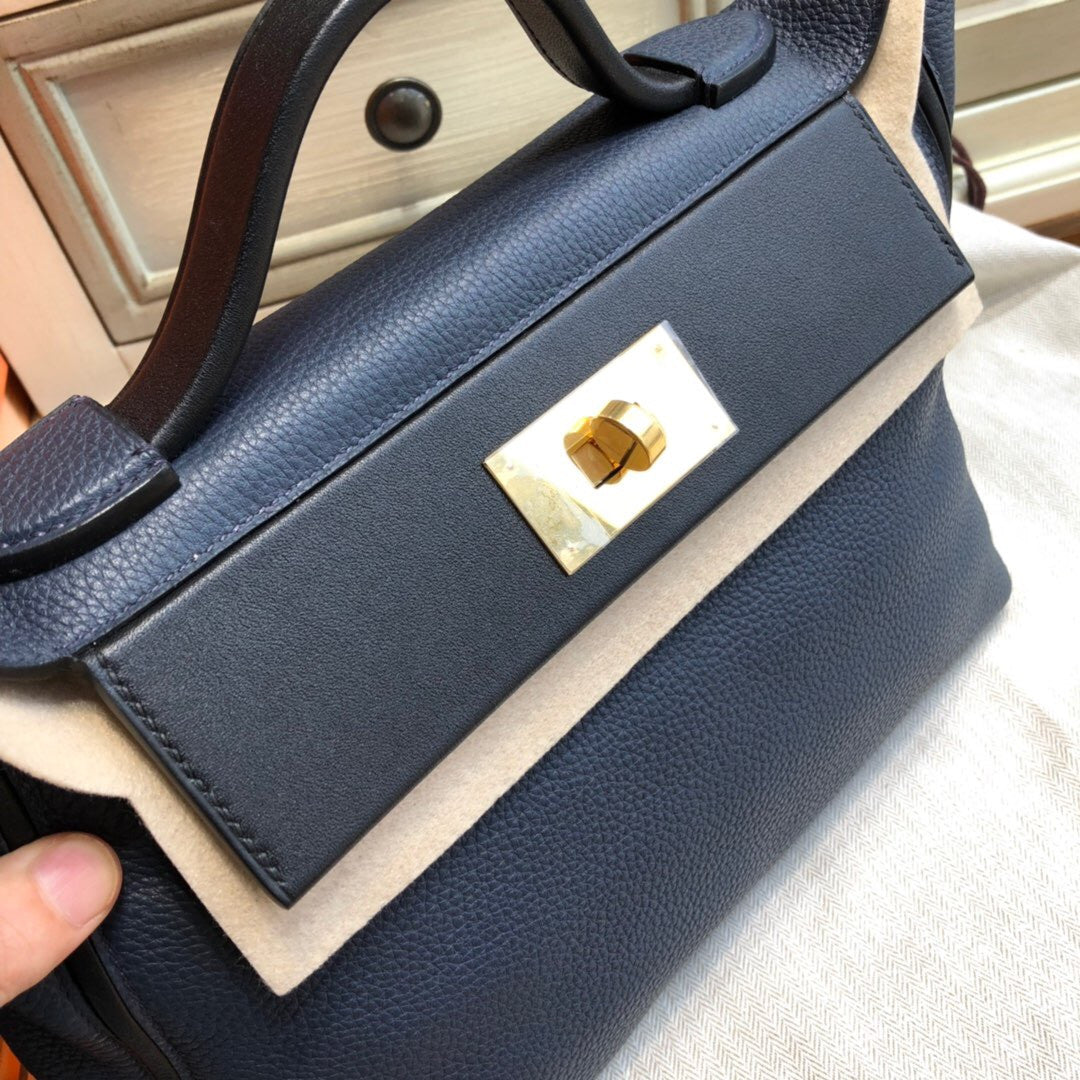 Hermes Kelly 24/24  Black/Navy Blue Swift & Togo Leather with Gold Hardware