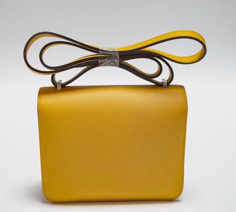 Hermes Jaune d'or Constance Epsom leather 18cm With Enamel Hardware