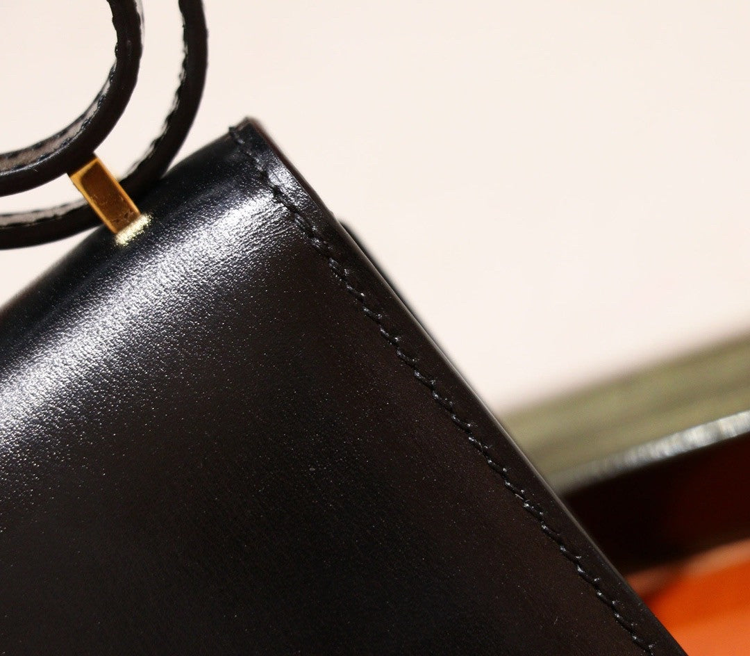 Hermès Hermes Constance micro handbag in black box leather