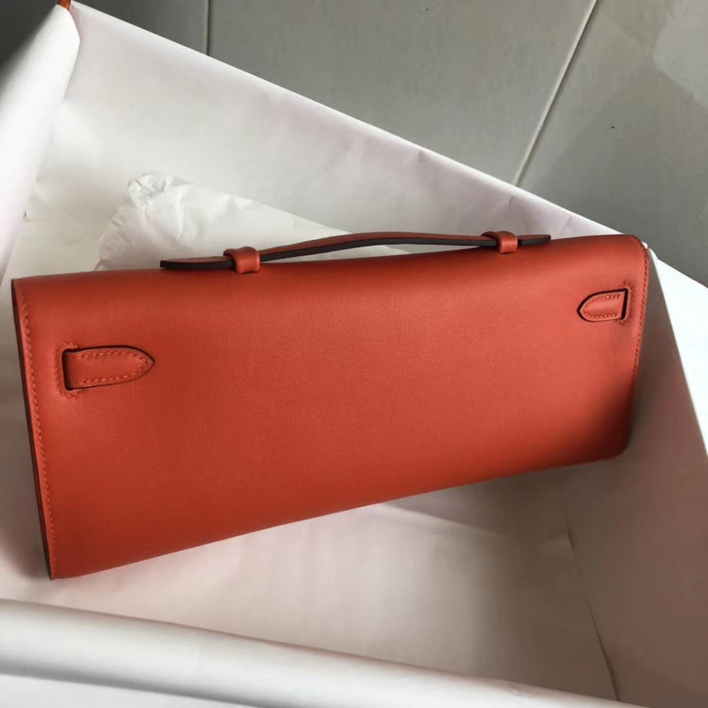 HERMES KELLY CUT CLUTCH BAG ORANGE SWIFT GOLD HARDWARE