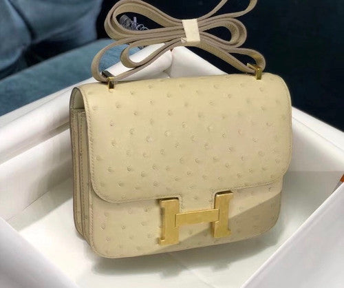 HERMÈS Constance 24 Wool White Ostrich with Gold Hardware