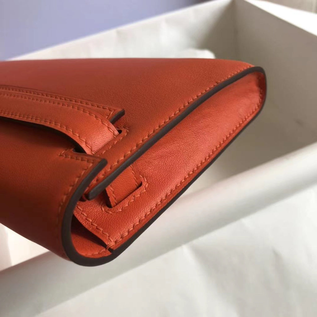 HERMES KELLY CUT CLUTCH BAG ORANGE SWIFT GOLD HARDWARE
