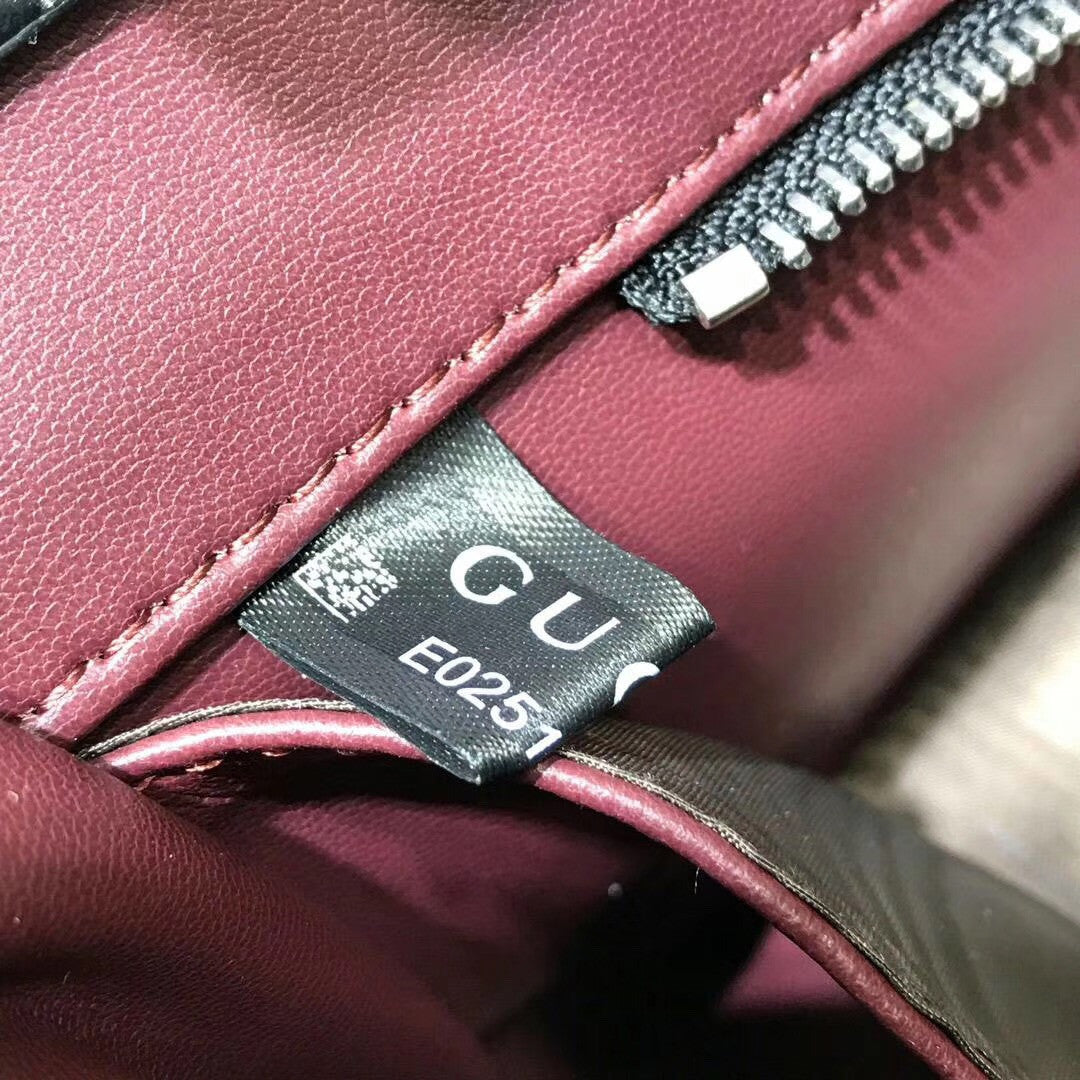 Gucci Zumi python medium top handle bag