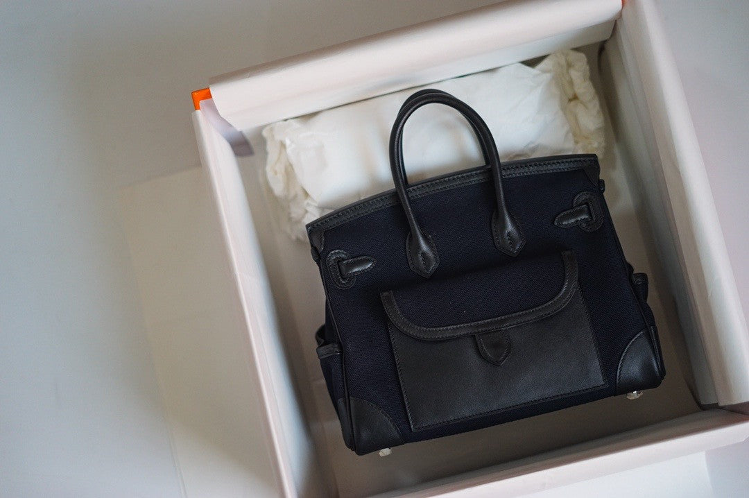 Hermes Limited Edition Cargo Birkin 25 cm Black Swift and canvas