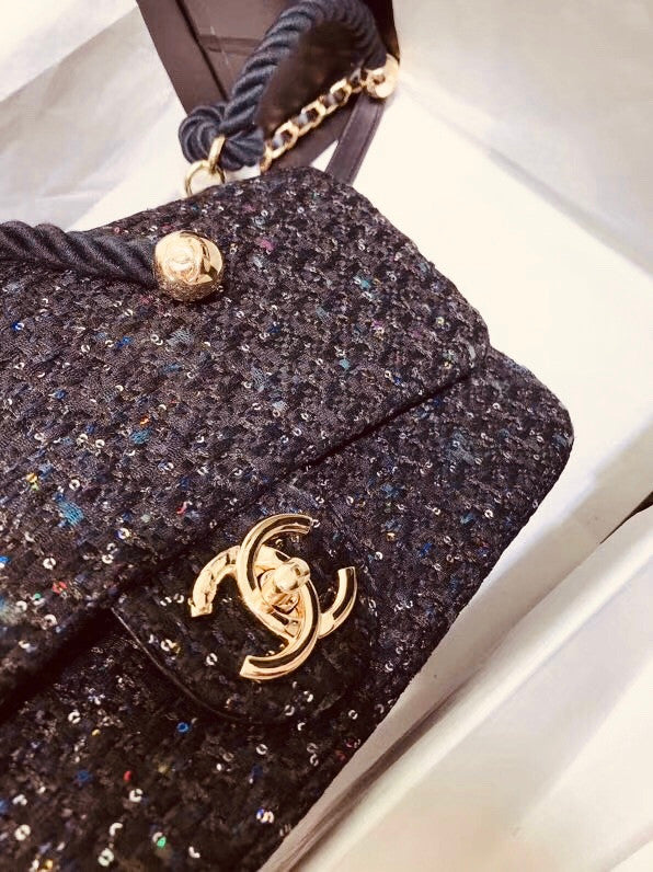 Chanel Pearl flap bag in black tweed