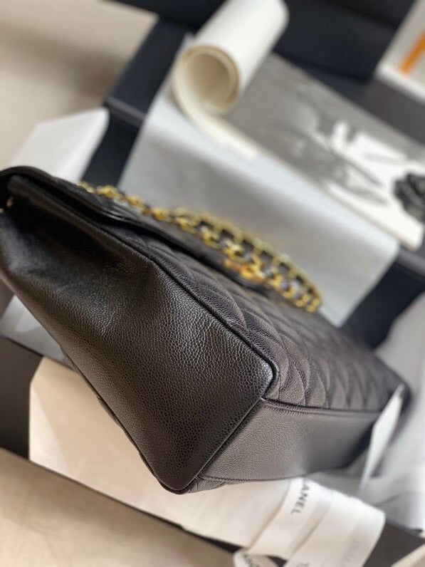 Chanel  BLACK QUILTED CAVIAR LEATHER JUMBO CLASSIC SINGLE FLAP BAG
