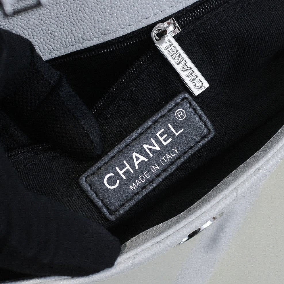 Chanel Small Grained Calfskin Lacquered Logo Flap Bag