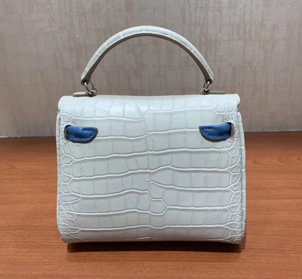 Hermes Kelly Idole (Kelly Doll) in GRIS PERLE Alligator with Palladium hardware.