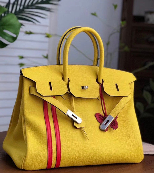 HERMÈS  LIMITED EDITION OFFICIER BIRKIN 35 SOLEIL TOGO HANDBAG
