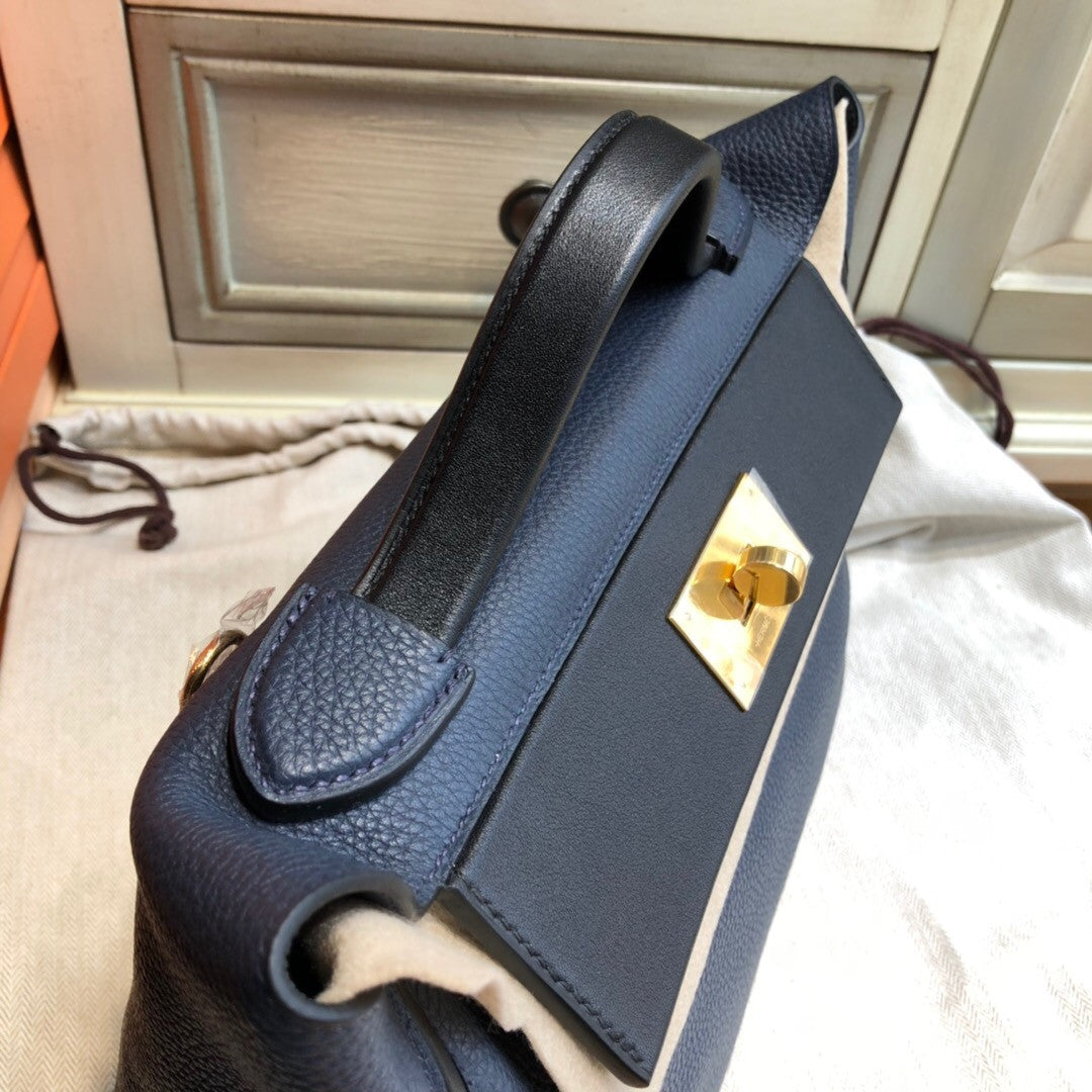 Hermes Kelly 24/24  Black/Navy Blue Swift & Togo Leather with Gold Hardware