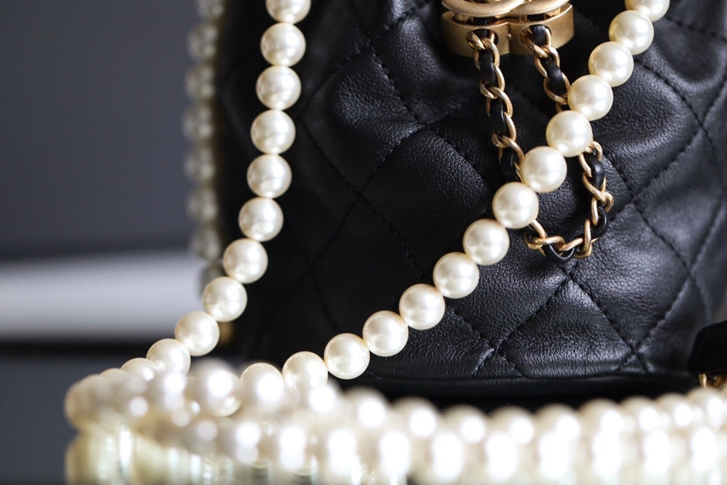 Chanel mini pearl drawstring bag