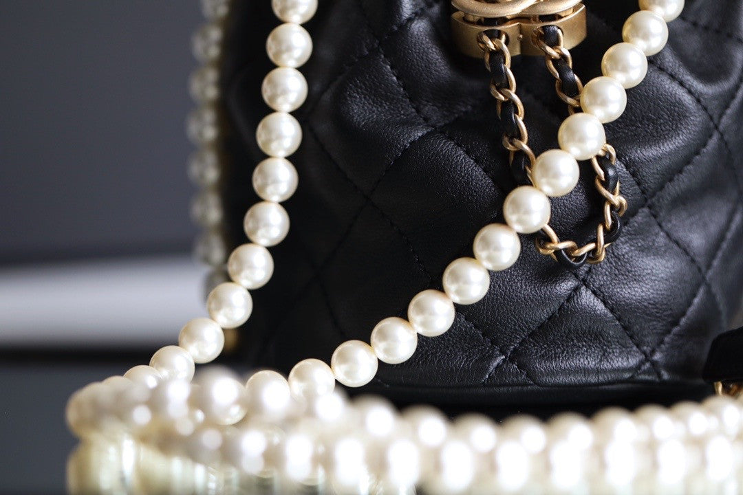 Chanel mini pearl drawstring bag