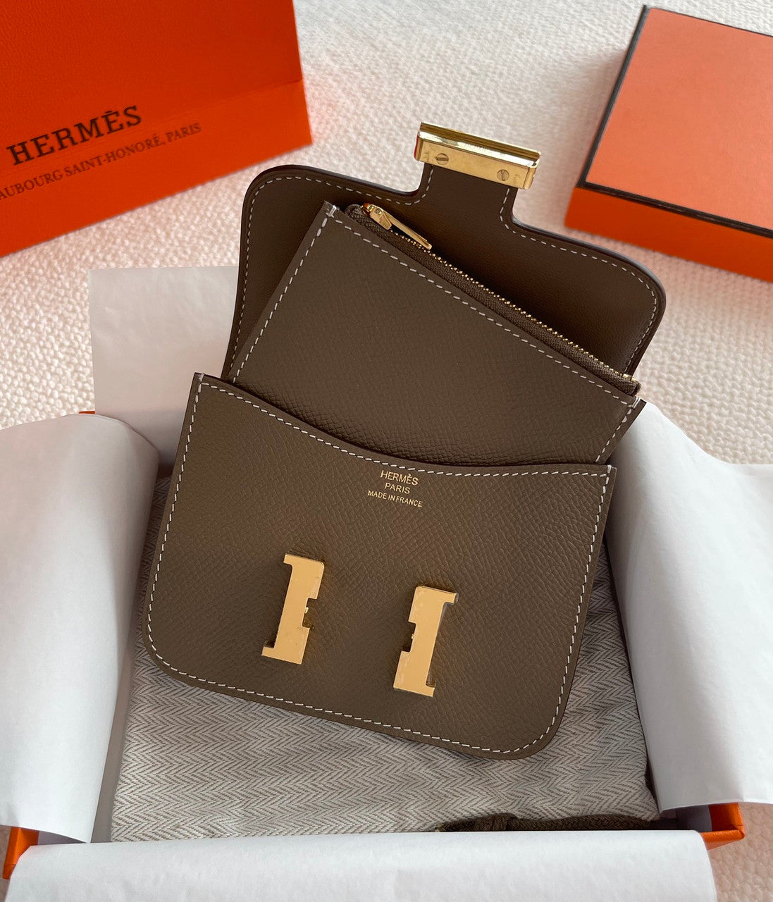 Hermès Constance Slim wallet Etoupe Epsom leather with gold hardware