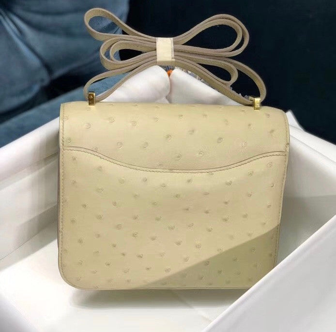 HERMÈS Constance 24 Wool White Ostrich with Gold Hardware
