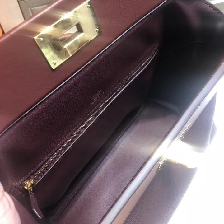 Hermes Kelly 24/24  Bordeaux & Rouge  Swift & Togo Leather with Gold Hardware