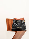 CHANEL 22 SMALL HANDBAG Shiny Aged Lambskin Shearling