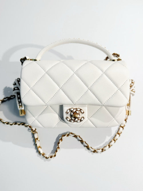Chanel CRUISE 2024/25 WHITE FLAP BAG WITH TOP HANDLE  Lambskin & Gold Metal Chanel