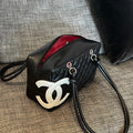 Vintage Chanel Cambon Bowler Bag White and Black Calfskin Silver Hardware