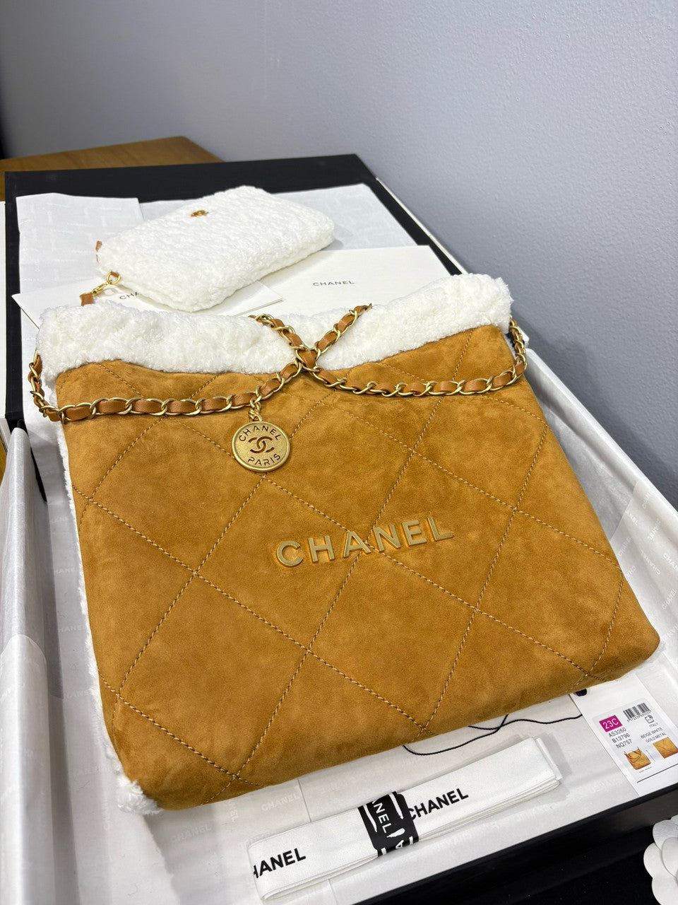 CHANEL 22 Small Handbag  Shearling Lambskin & Gold-Tone Meta