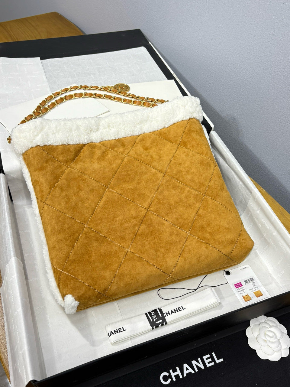CHANEL 22 Small Handbag  Shearling Lambskin & Gold-Tone Meta