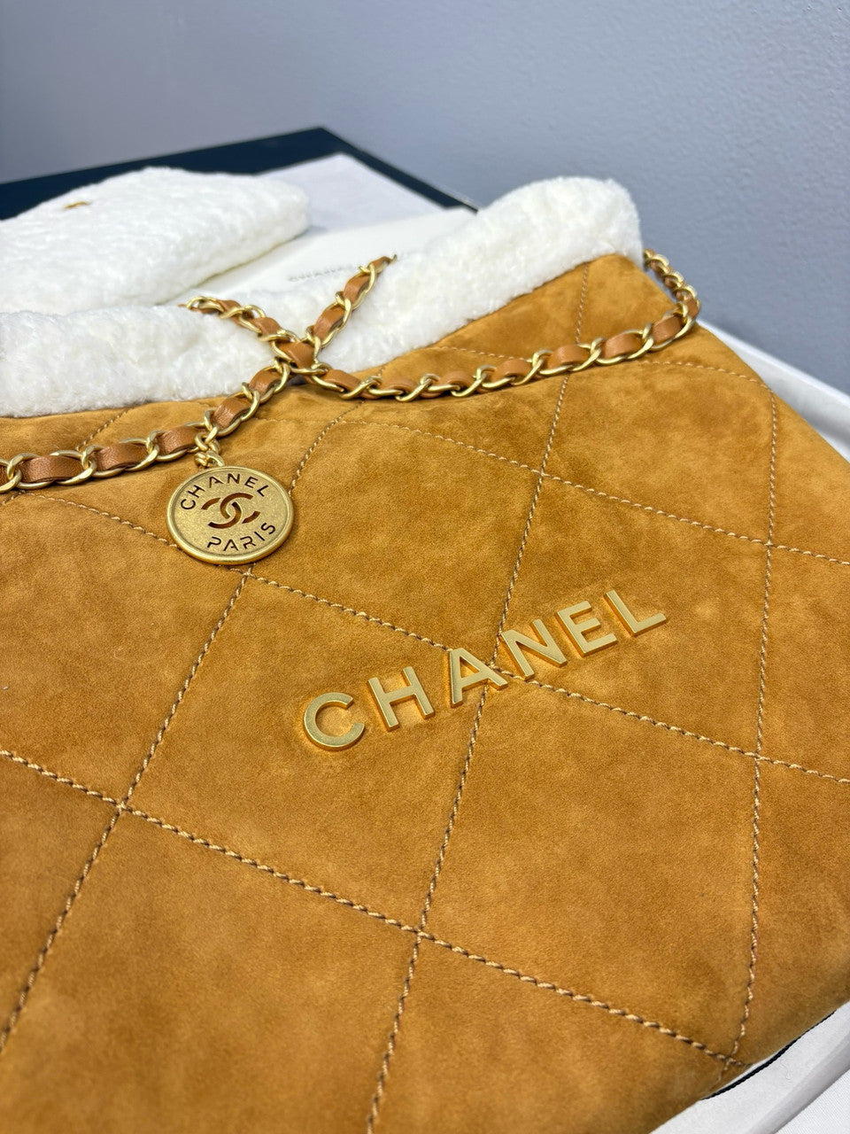 CHANEL 22 Small Handbag  Shearling Lambskin & Gold-Tone Meta