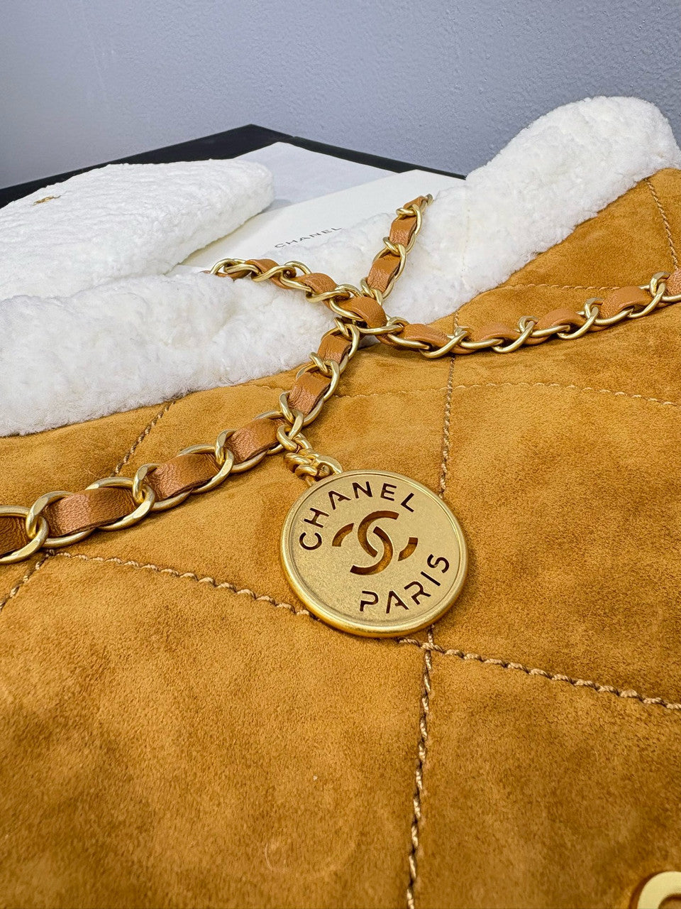 CHANEL 22 Small Handbag  Shearling Lambskin & Gold-Tone Meta