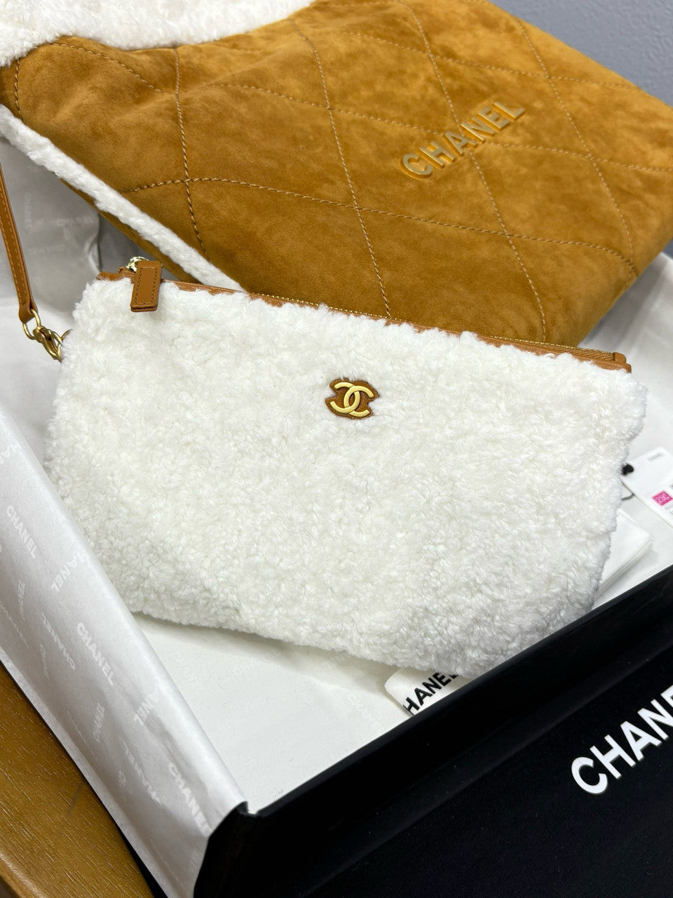 CHANEL 22 Small Handbag  Shearling Lambskin & Gold-Tone Meta
