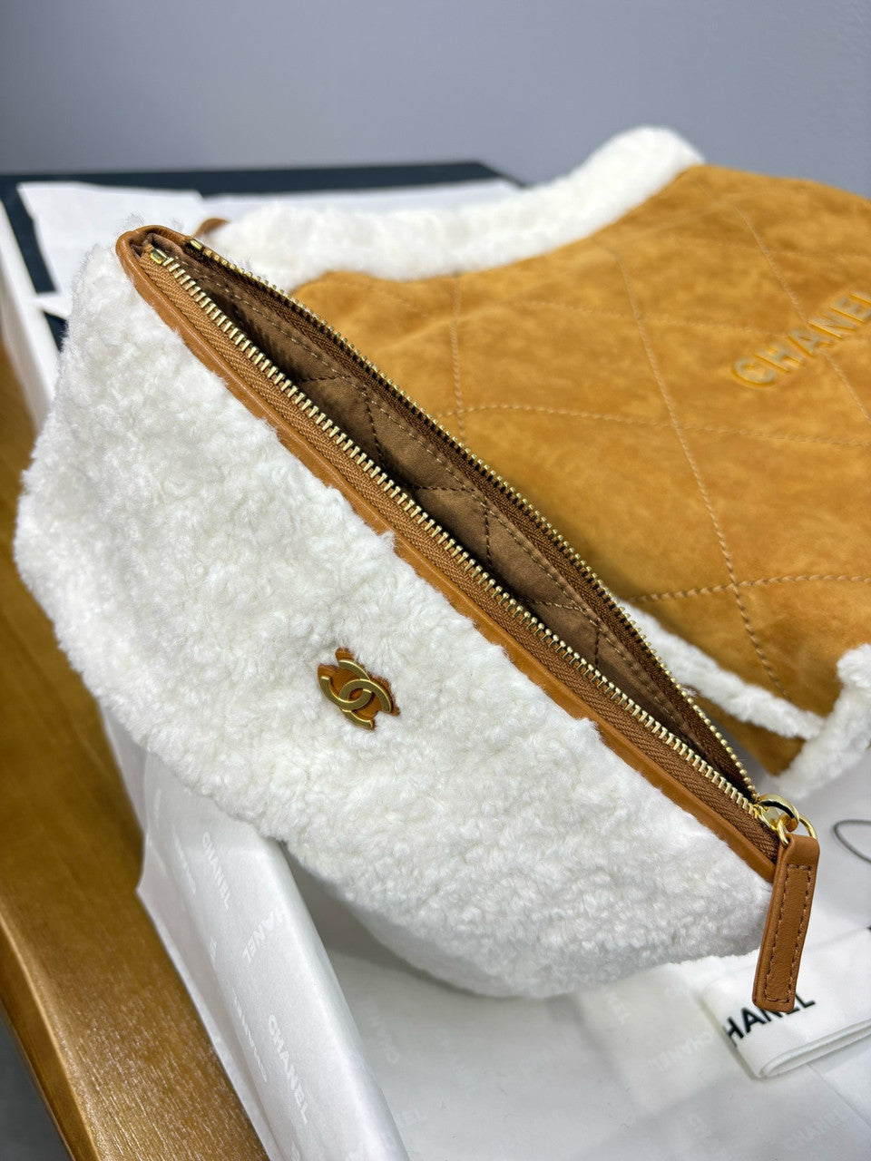 CHANEL 22 Small Handbag  Shearling Lambskin & Gold-Tone Meta