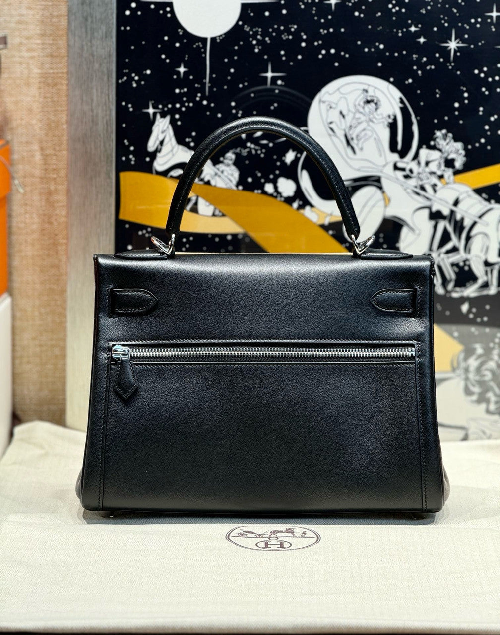 Hermes LIMITED EDITION BLACK SWIFT LEATHER LAKIS KELLY 28 WITH Palladium HARDWARE