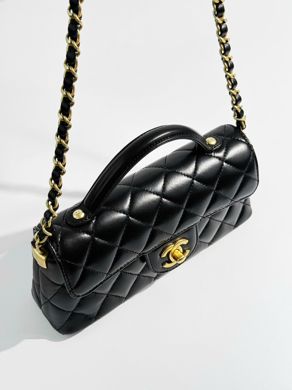 Chanel SPRING-SUMMER 2025 PRE-COLLECTION  BLACK MINI FLAP BAG WITH TOP HANDLE