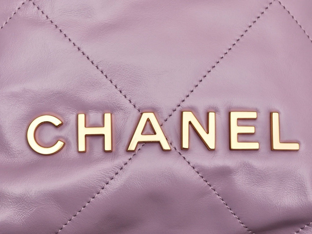 CHANEL 22 MINI HANDBAG GOLD LOGO SS2023 LILAC