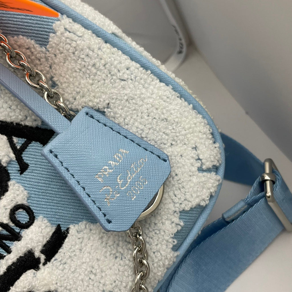 Prada Re-Edition 2006 embroidered drill shoulder bag Blue